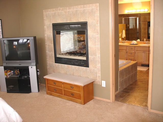 double sided fireplace in master bedroom