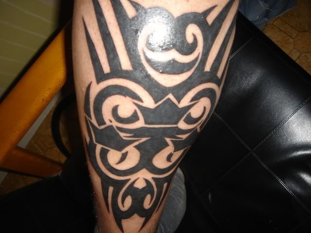 http://i165.photobucket.com/albums/u72/frosth__/tatoo.jpg